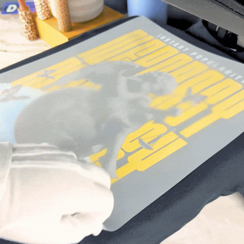 DTF transfers being applied to fabric