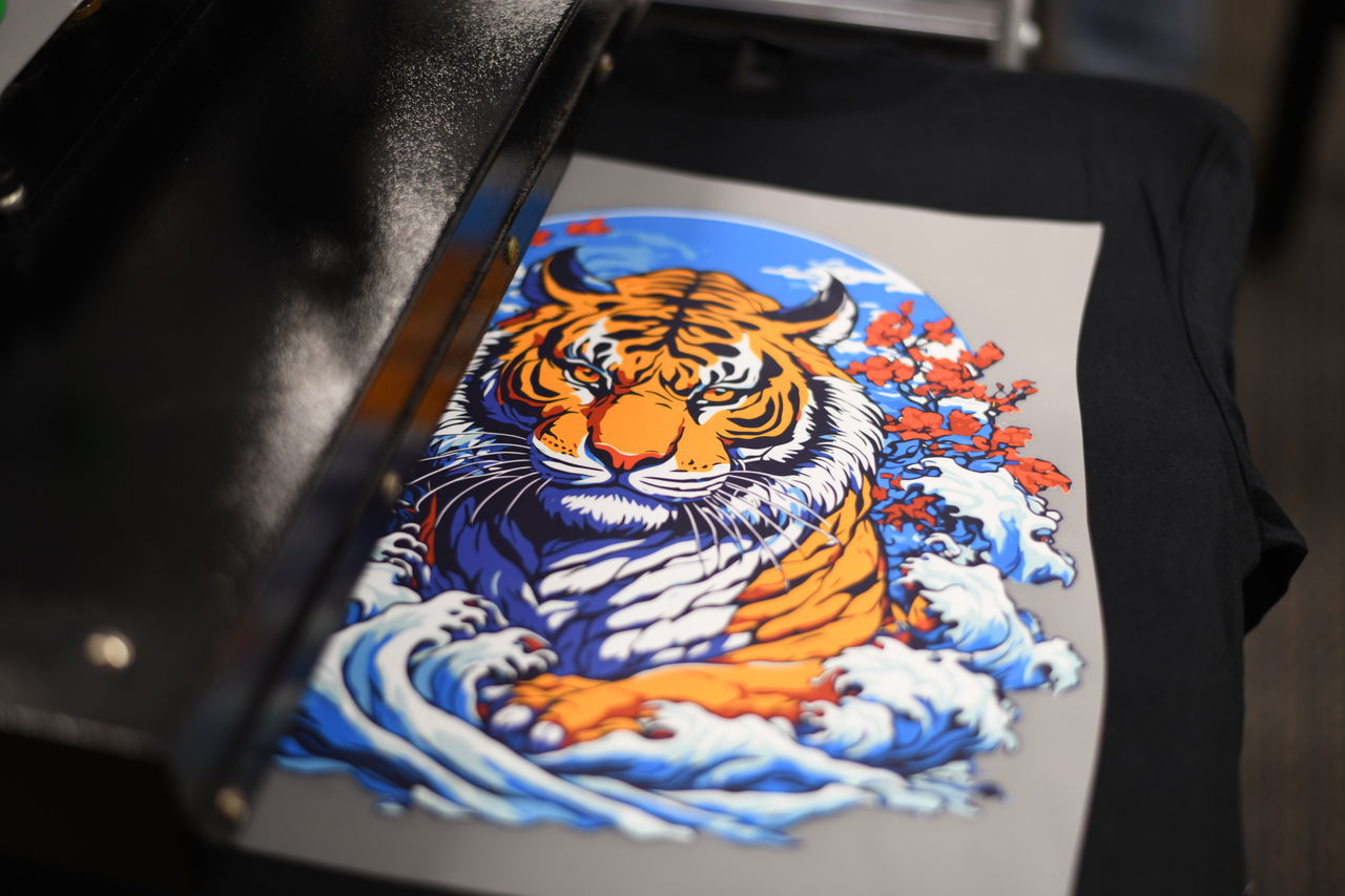 Heat press applying DTF transfer at 305°F for 10 seconds