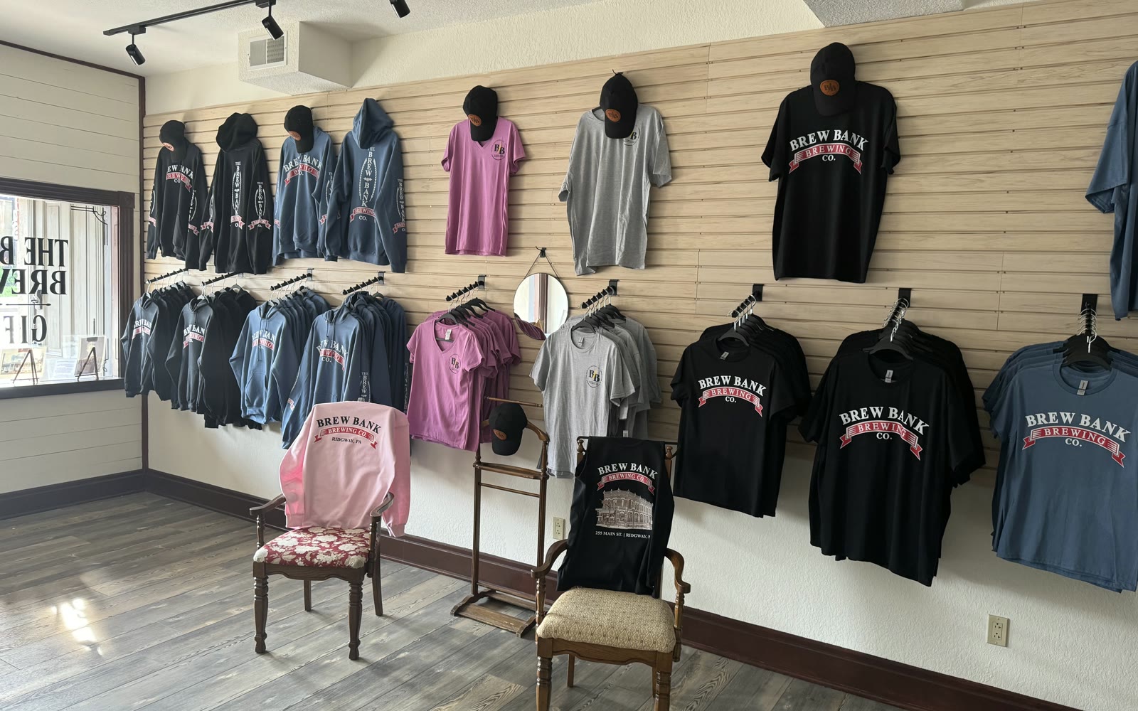 Customer apparel display featuring shirts made with custom DTF transfers
