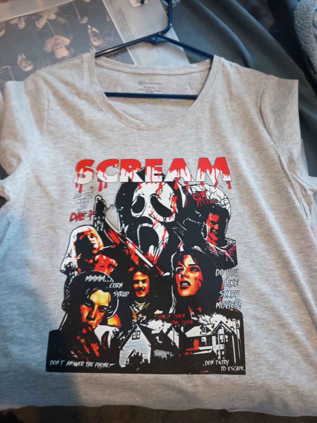 Customer shirt with detailed red and black horror artwork