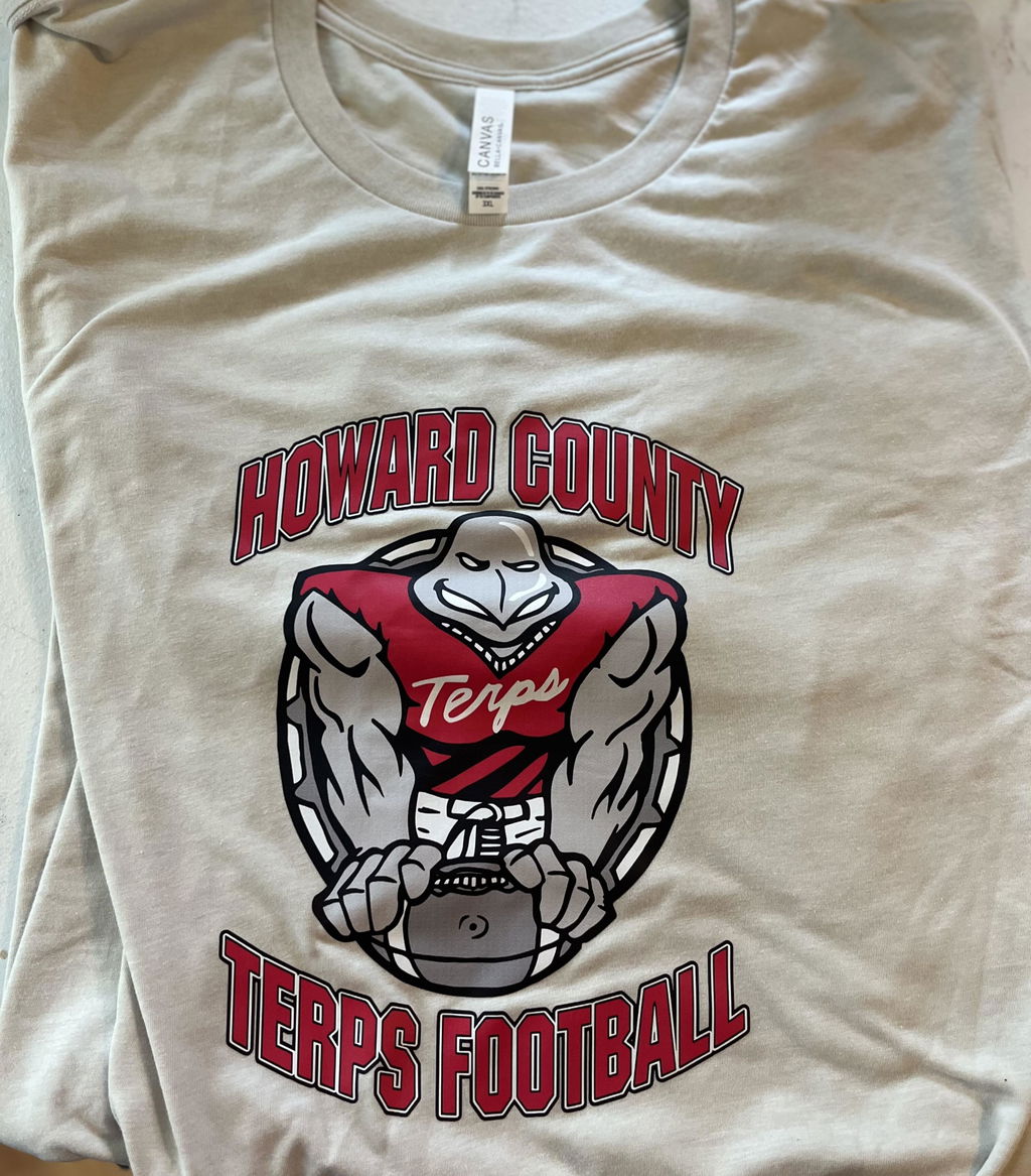 White customer shirt with detailed red and black football artwork