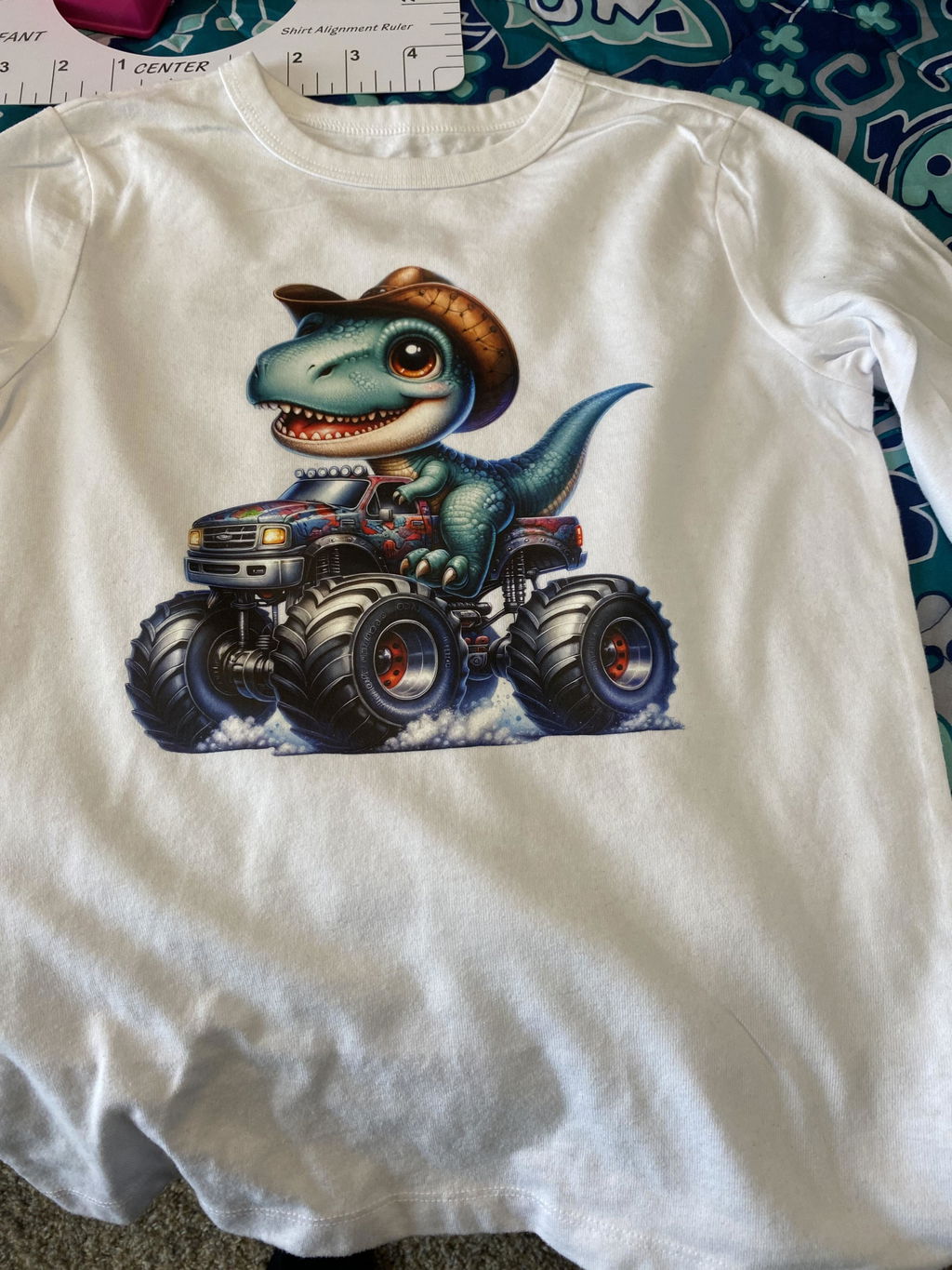 Customer shirt with colorful reptile artwork and fine black detail