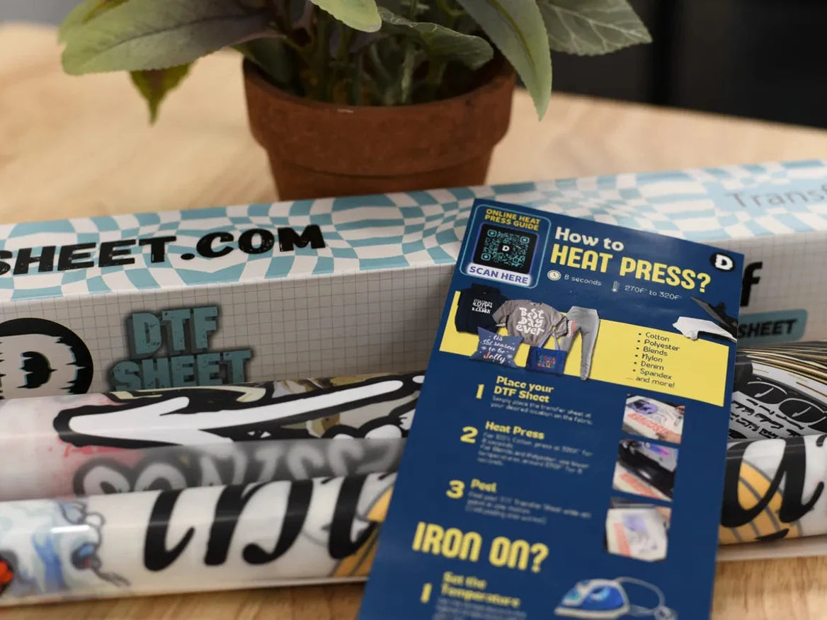 An opened DTFSheet delivery with transfers and printed press instructions